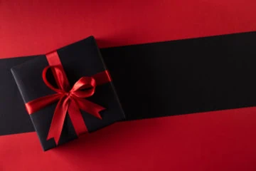 wrapped gift to represent black friday, christmas, and january sales