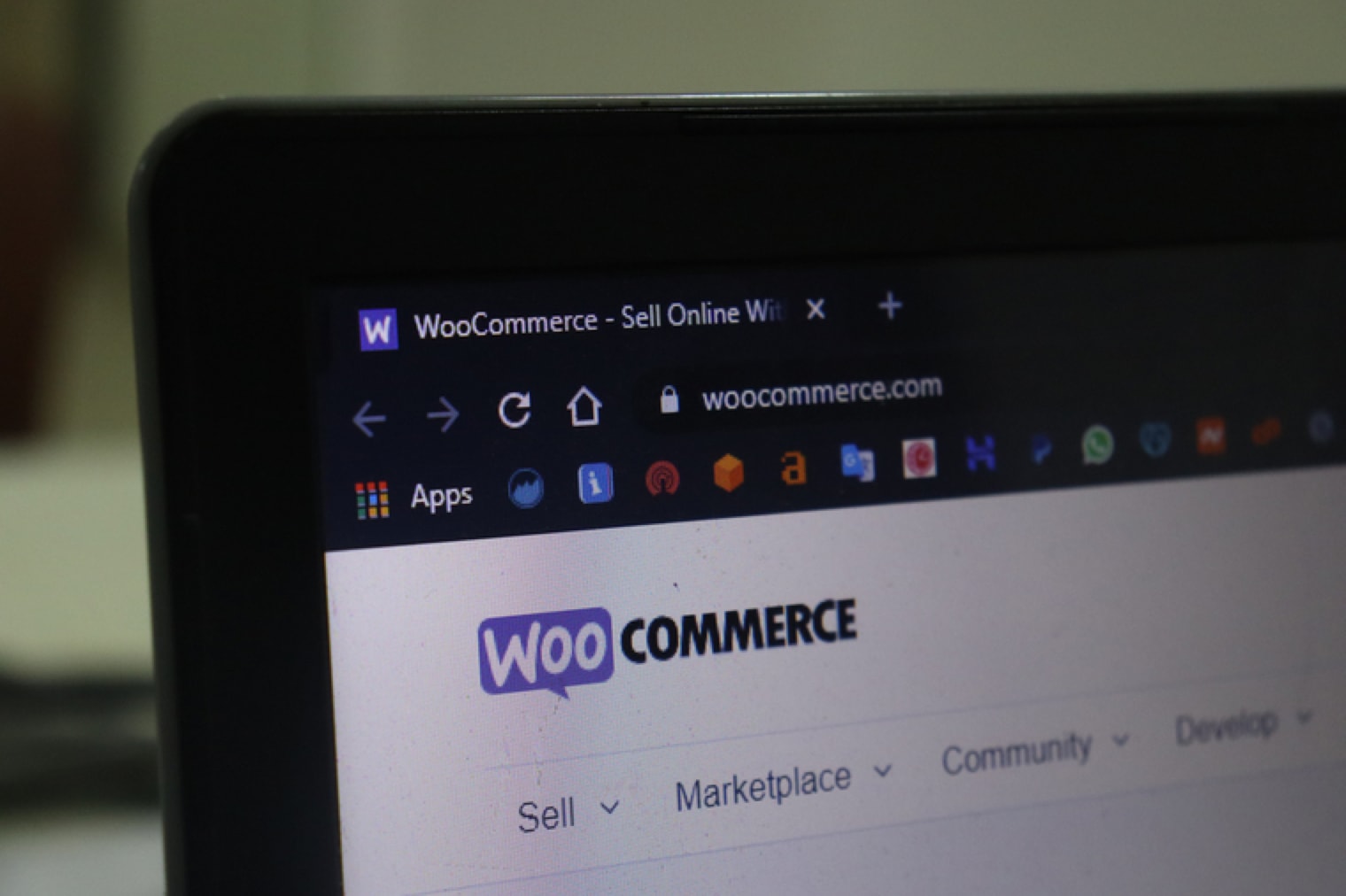image of the woocommerce website open on a laptop screen